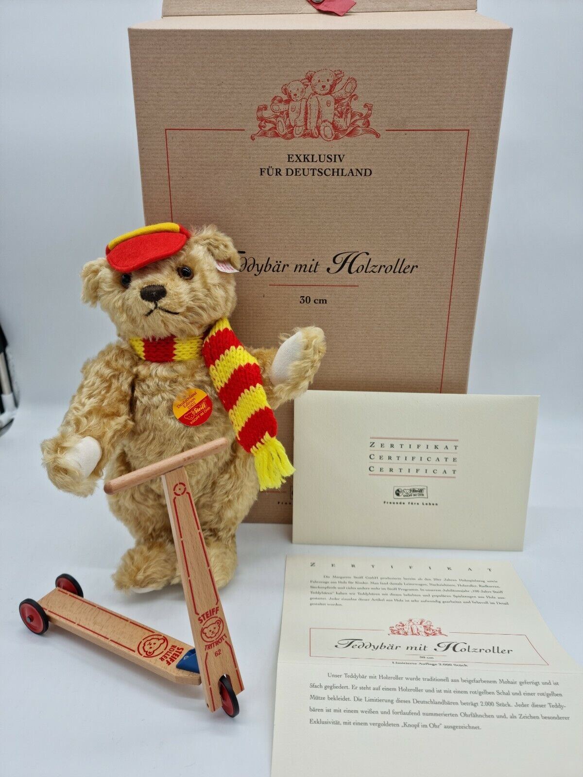 SAMMLER: Steiff 671142 "Teddybär mit Holzroller" neuwertig in OVP