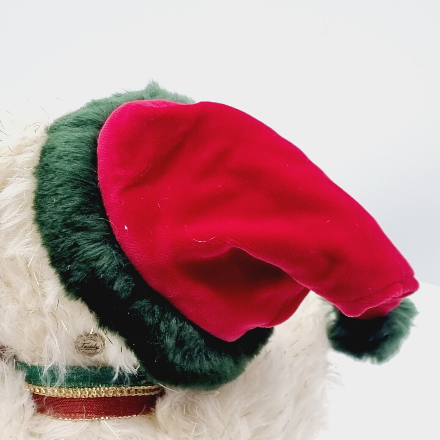 Teddy Hermann Weihnachtsteddybär mit Aufziehspielwerk weiß-gold 34 cm