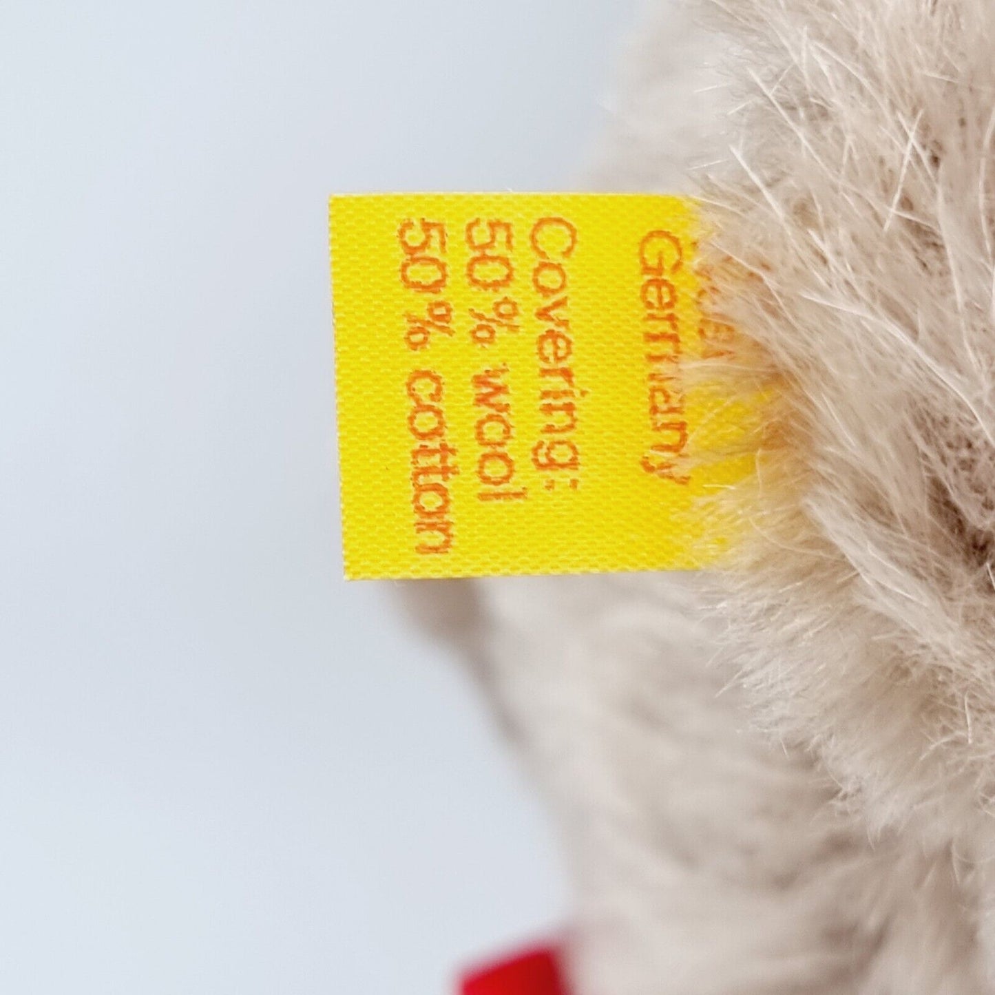 Steiff Teddybär 0228/33 33 cm grau mit roter Schleife