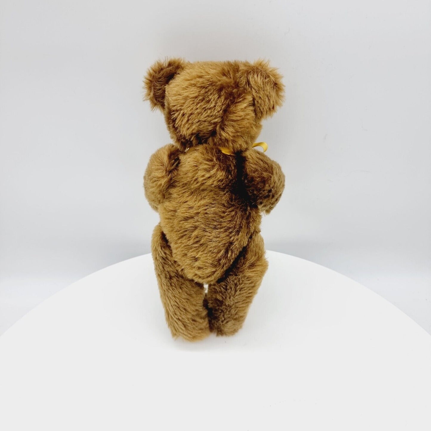 Steiff 000447 Teddybär mit gelber Schleife