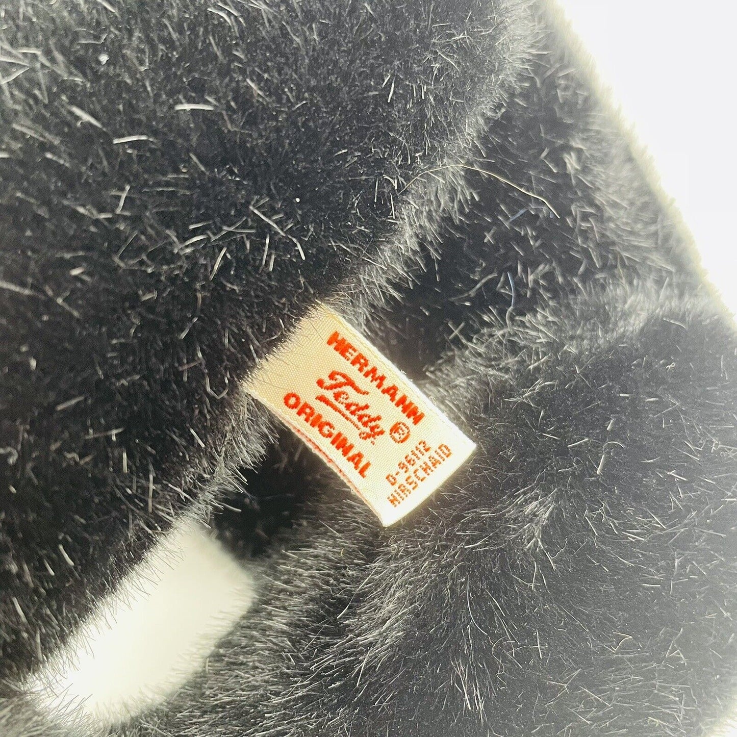 Hermann Teddy Hirschaid Teddybär schwarz mit grünen Pfoten 40cm