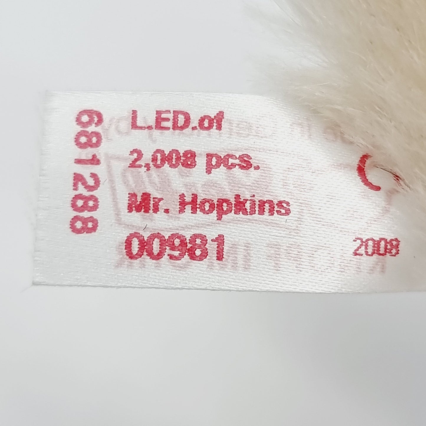 7750275