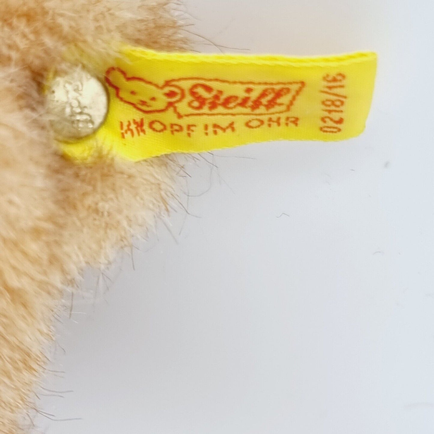 Steiff 0218/16 Knöpchen Teddybär 16 cm mit oragangefarbener Shorts