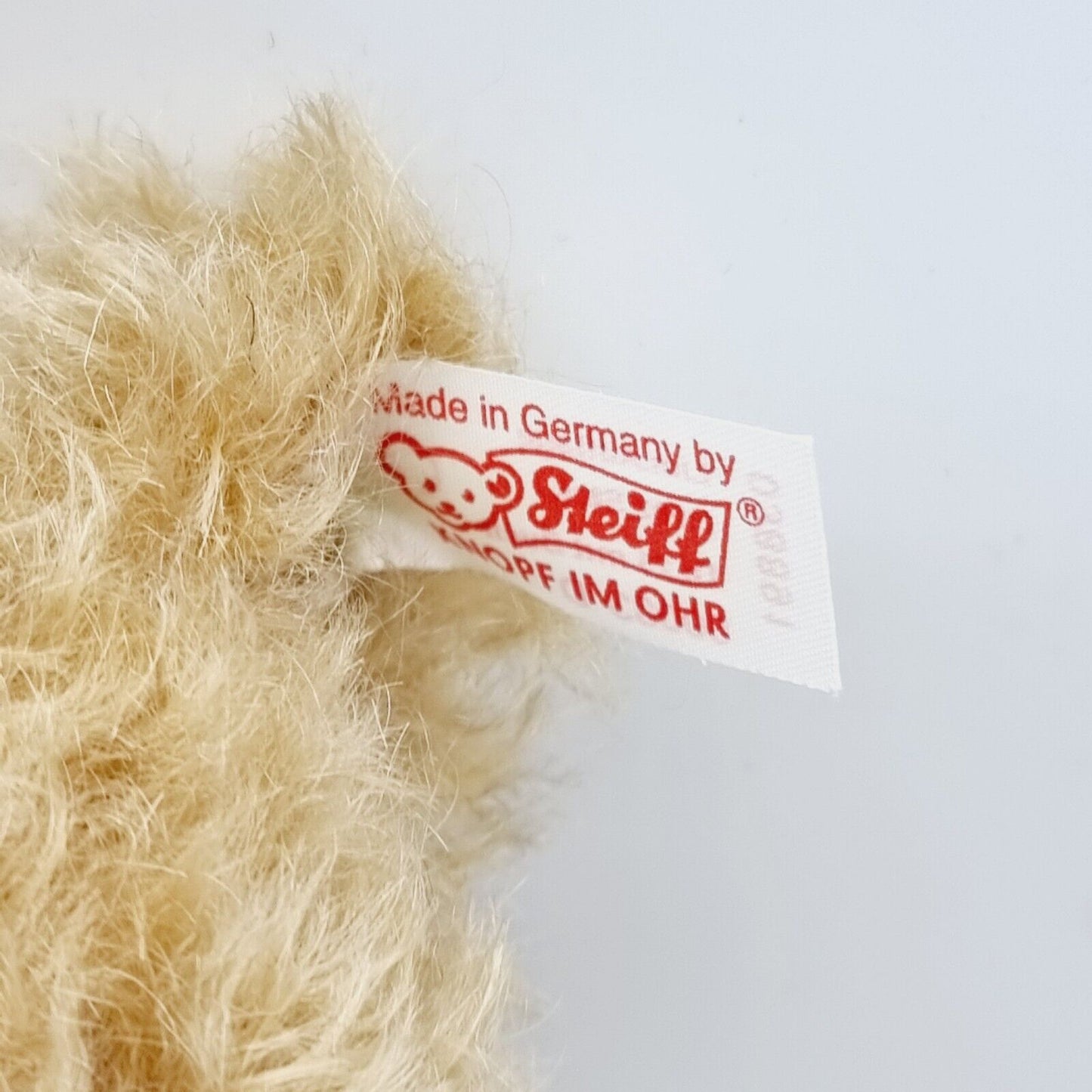 Steiff 038891 Teddybär mit Buch 25 cm 100 Jahre Steiff mit Zertifikat Jahr 2002