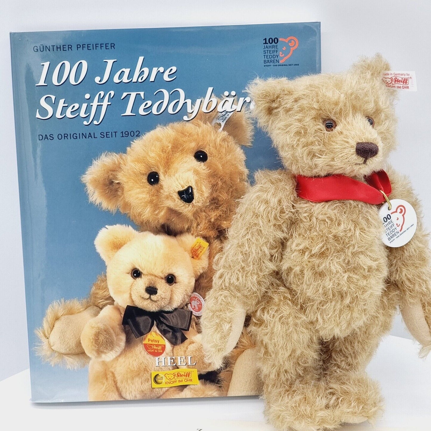 Steiff 038891 Teddybär mit Buch 25 cm 100 Jahre Steiff mit Zertifikat Jahr 2002
