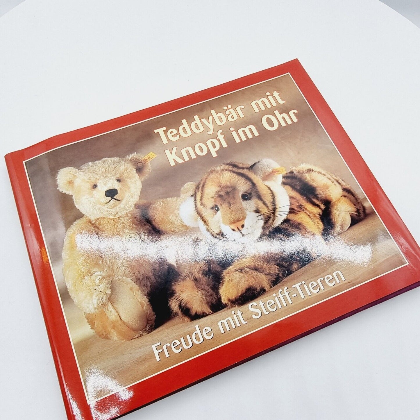 Steiff 670176 Teddybär blond mit Buch "Teddybär mit Knopf im Ohr limitiert 1000