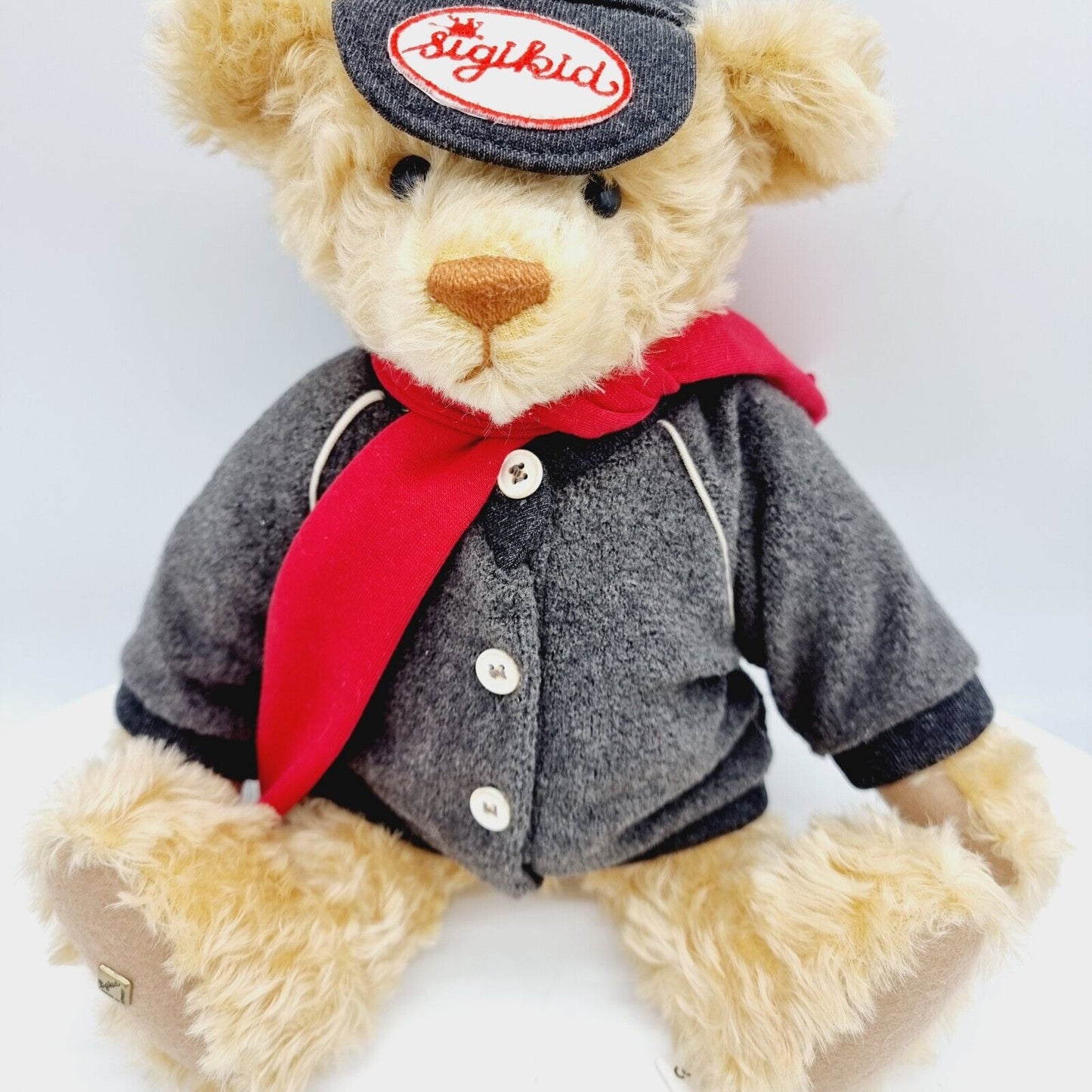 Sigikid Teddybär mit Schal und Mütze 36 cm
