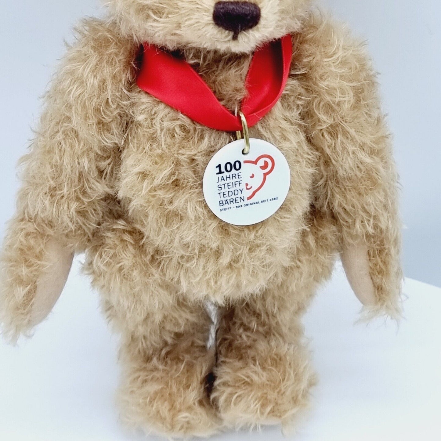 Steiff 038891 Teddybär mit Buch 25 cm 100 Jahre Steiff mit Zertifikat Jahr 2002