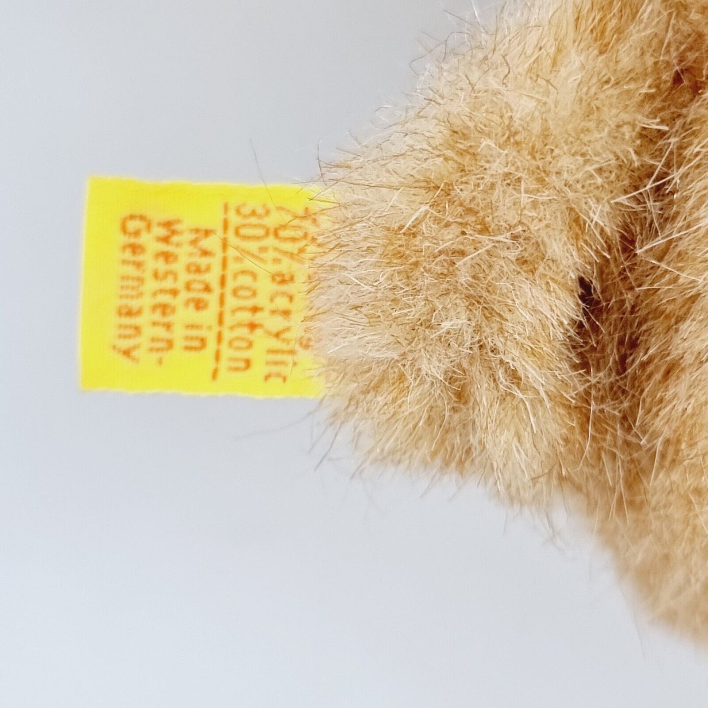Steiff 0218/16 Knöpchen Teddybär 16 cm mit oragangefarbener Shorts