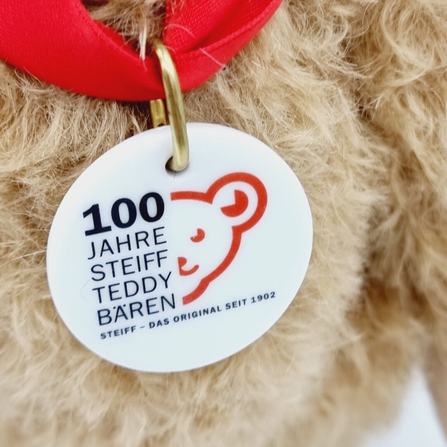 Steiff 038891 Teddybär mit Buch 25 cm 100 Jahre Steiff mit Zertifikat Jahr 2002