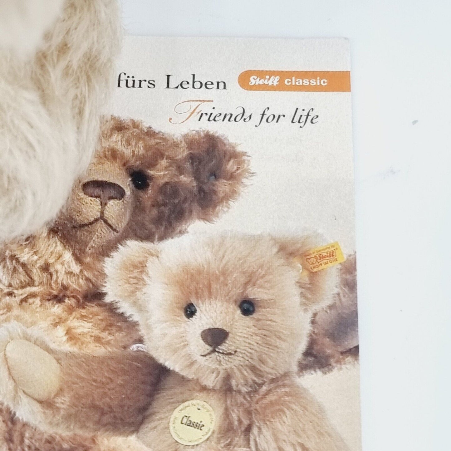 Steiff 001819 Classic Teddybär 20 cm mit blauer Schleife Etikett