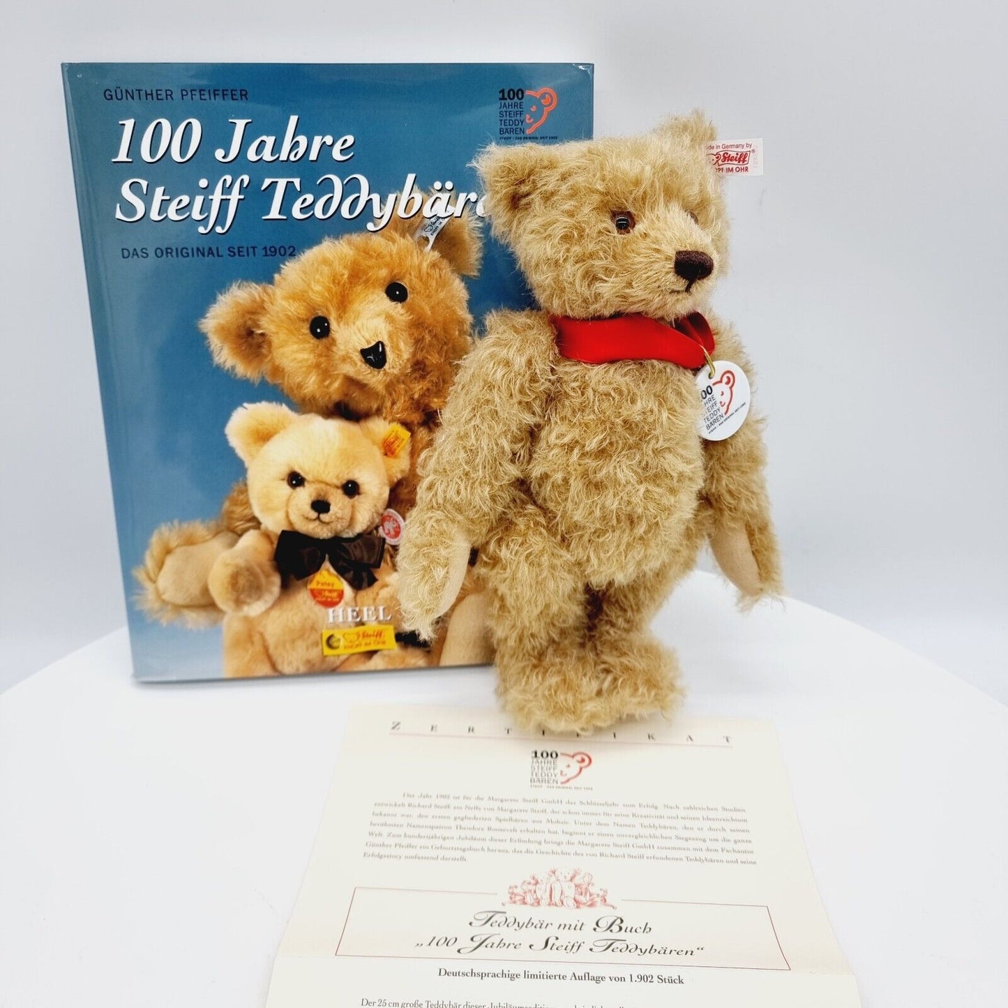Steiff 038891 Teddybär mit Buch 25 cm 100 Jahre Steiff mit Zertifikat Jahr 2002