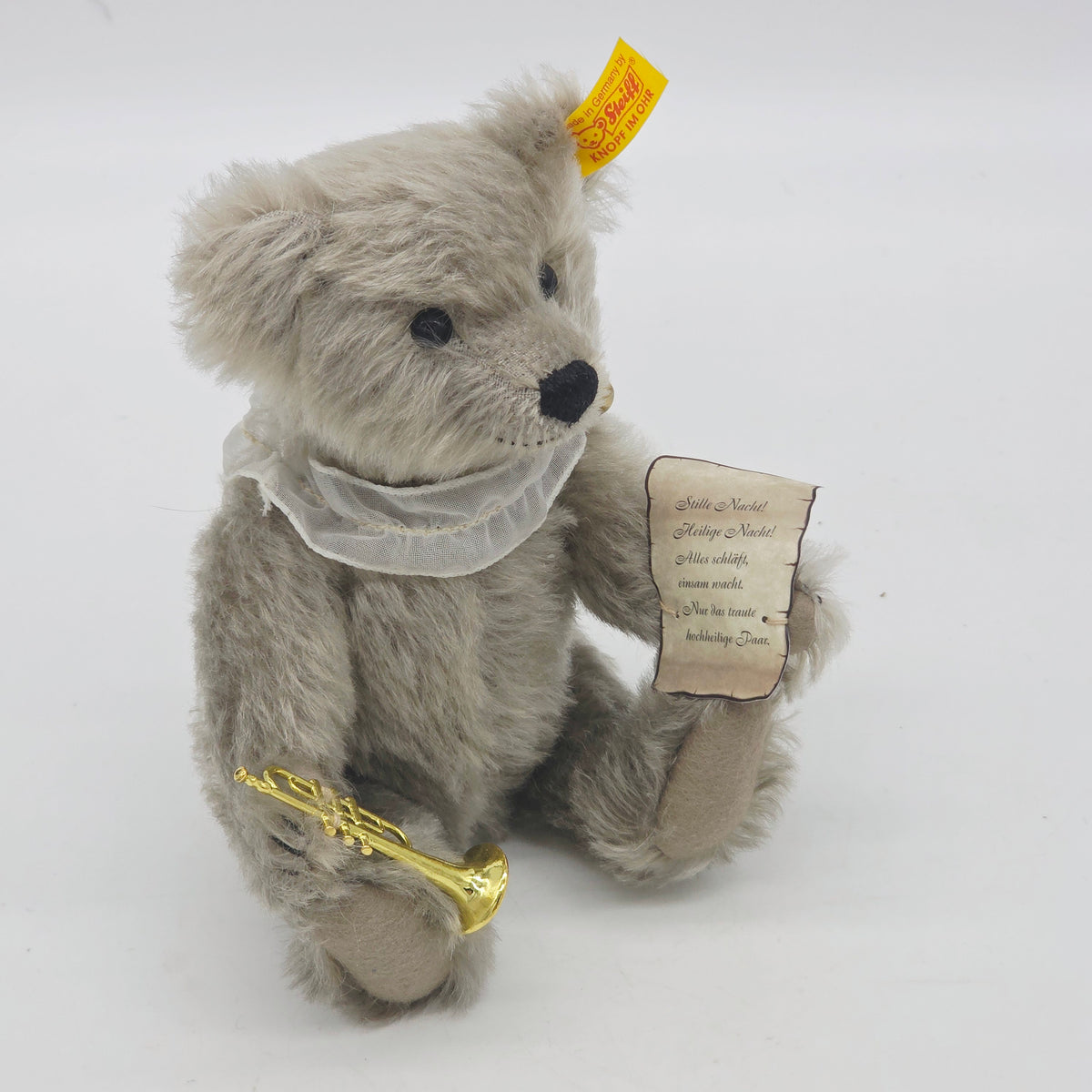Steiff 672576 Teddybär mit Trompete