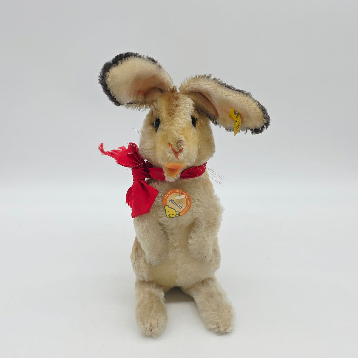 Steiff 3020/30 Manni Hase mit Schleife aufwartend 30 cm Mohair 1968 - 1976