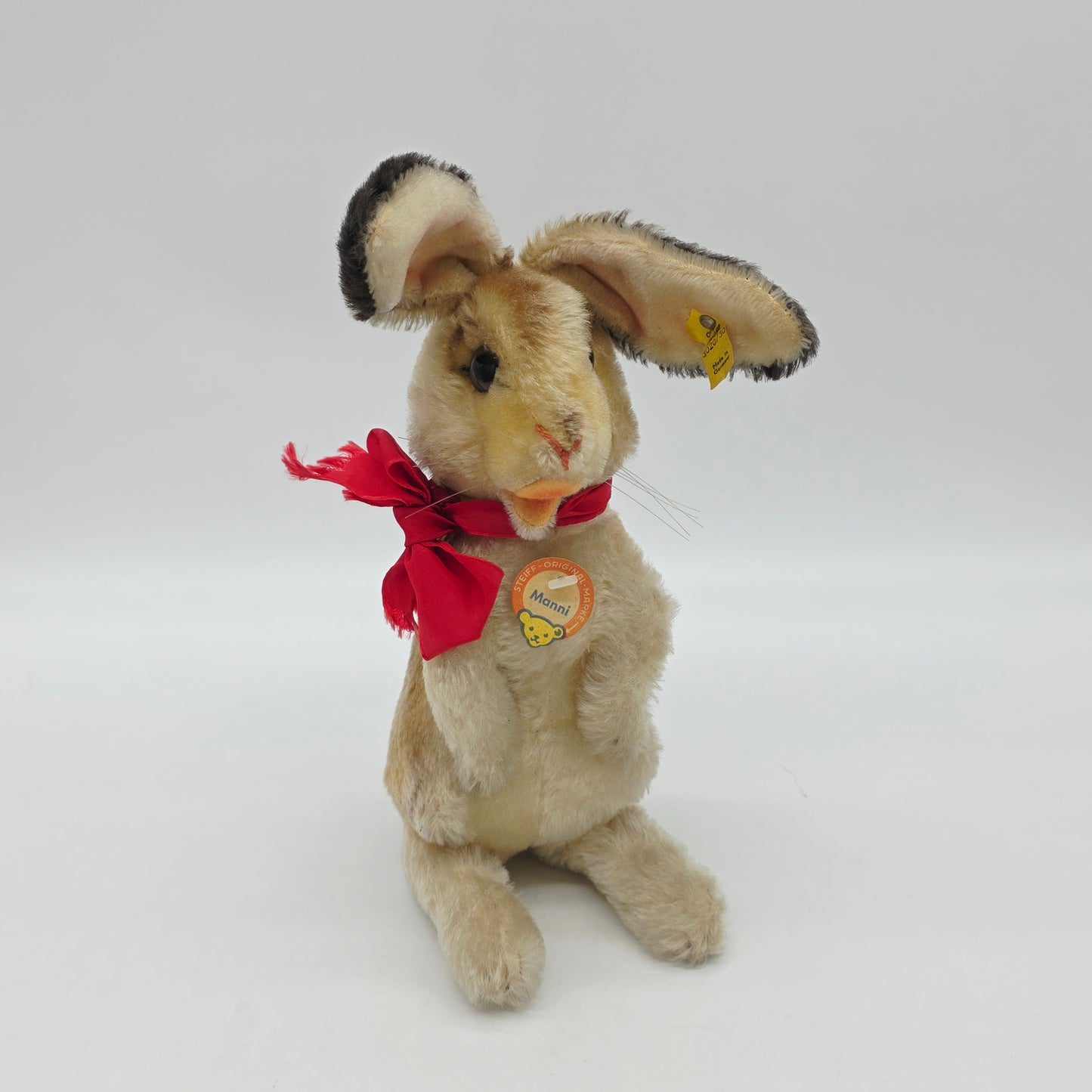 Steiff 3020/30 Manni Hase mit Schleife aufwartend 30 cm Mohair 1968 - 1976