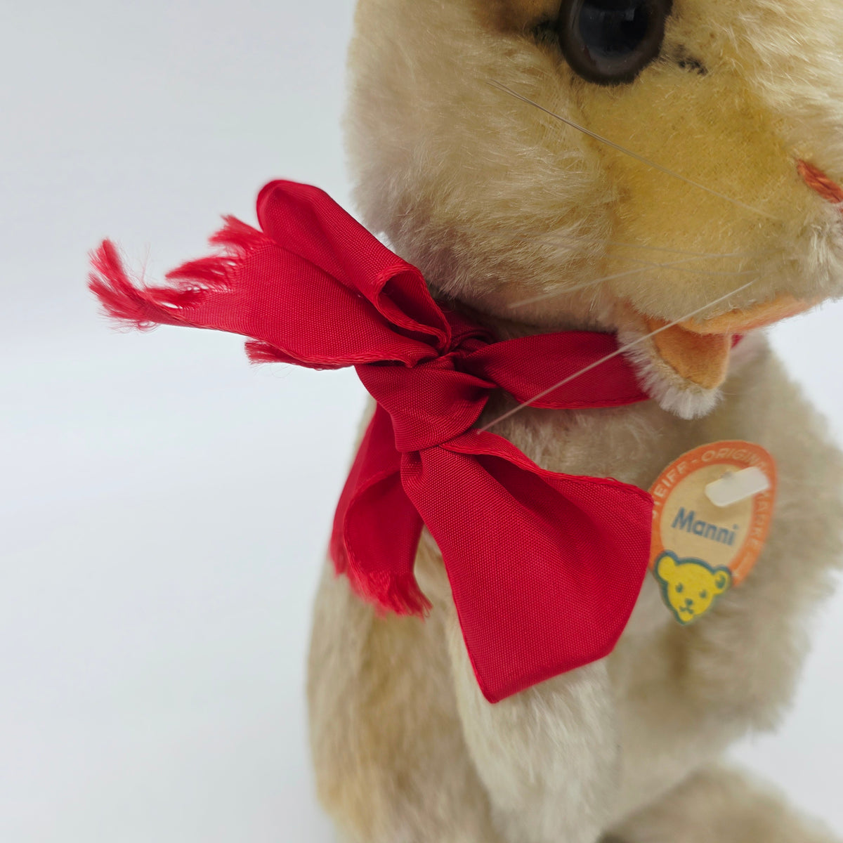 Steiff 3020/30 Manni Hase mit Schleife aufwartend 30 cm Mohair 1968 - 1976
