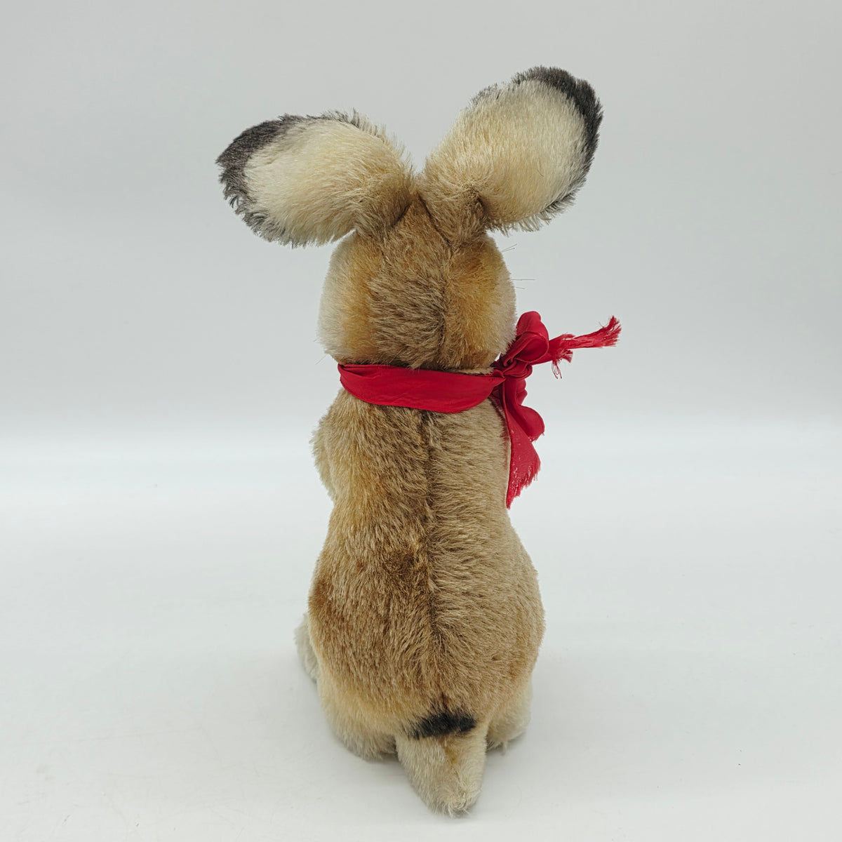 Steiff 3020/30 Manni Hase mit Schleife aufwartend 30 cm Mohair 1968 - 1976