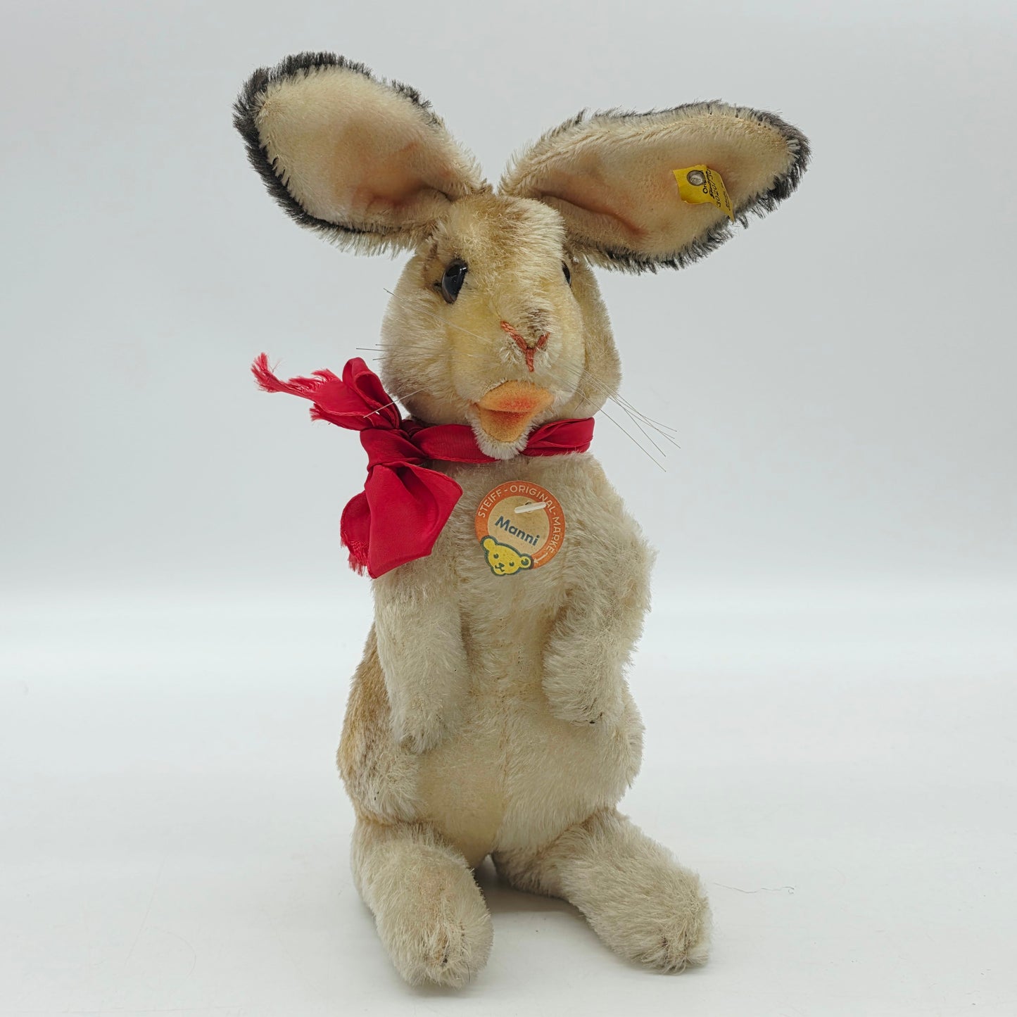 Steiff 3020/30 Manni Hase mit Schleife aufwartend 30 cm Mohair 1968 - 1976