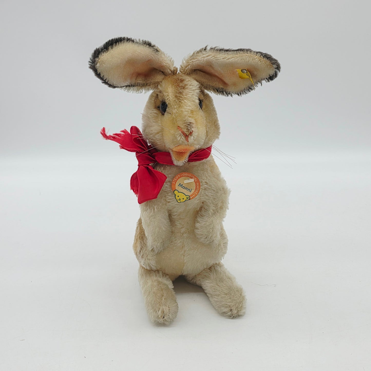 Steiff 3020/30 Manni Hase mit Schleife aufwartend 30 cm Mohair 1968 - 1976