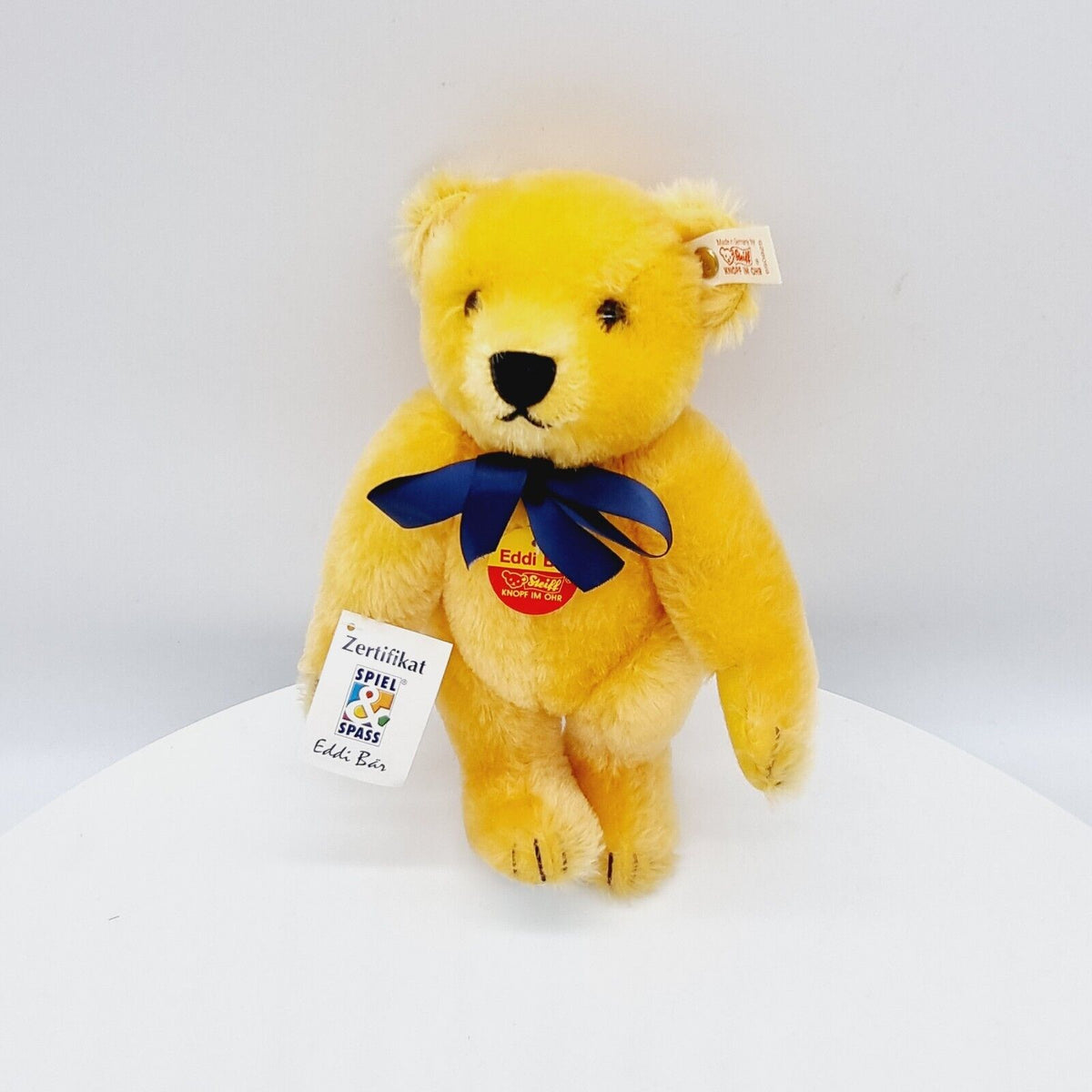 Steiff 650925 Teddybär Eddi Spiel und Spaß mit blauer Schleife