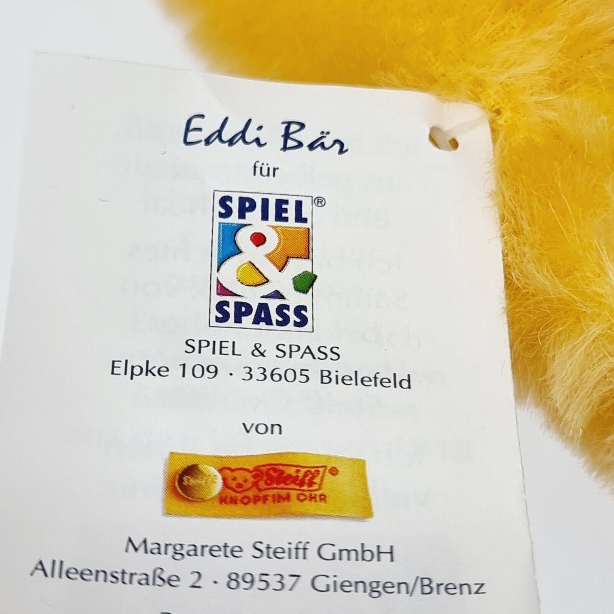 Steiff 650925 Teddybär Eddi Spiel und Spaß mit blauer Schleife