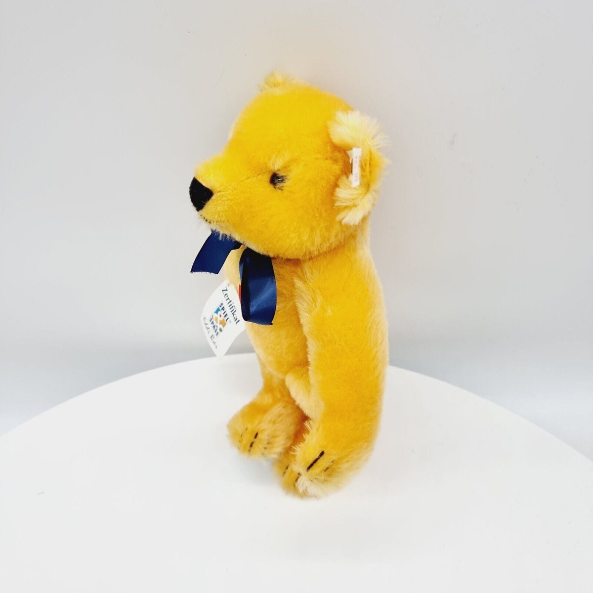 Steiff 650925 Teddybär Eddi Spiel und Spaß mit blauer Schleife