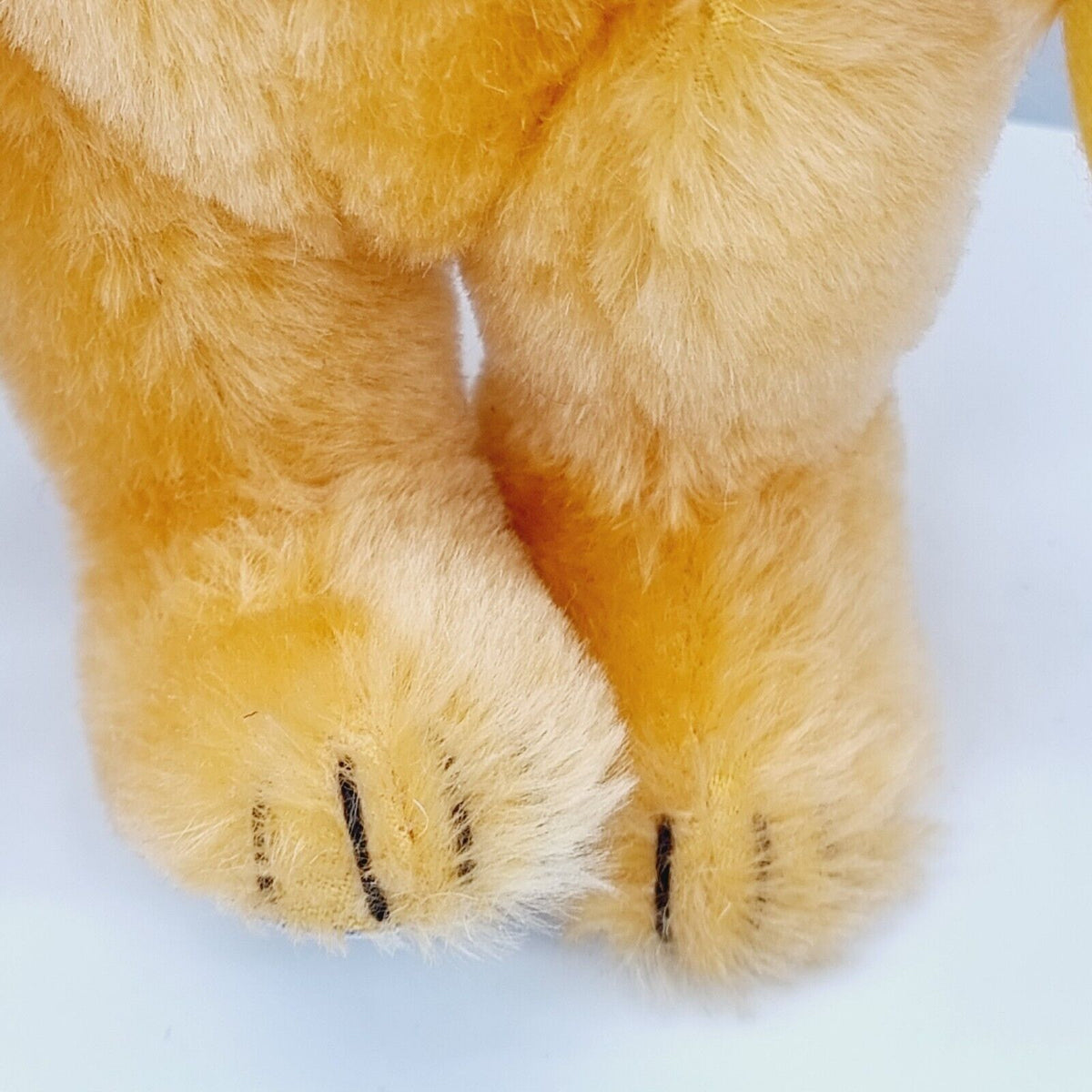 Steiff 650925 Teddybär Eddi Spiel und Spaß mit blauer Schleife