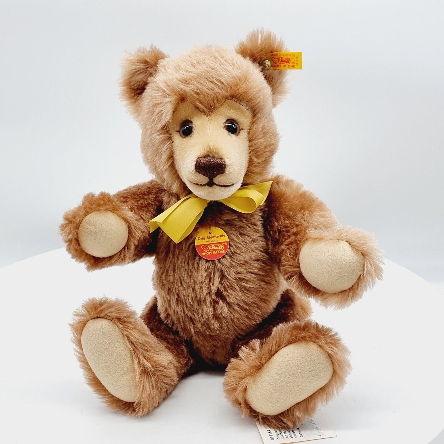 Steiff 011184 Teddybär mit Musikwerk und Schleife 39 cm