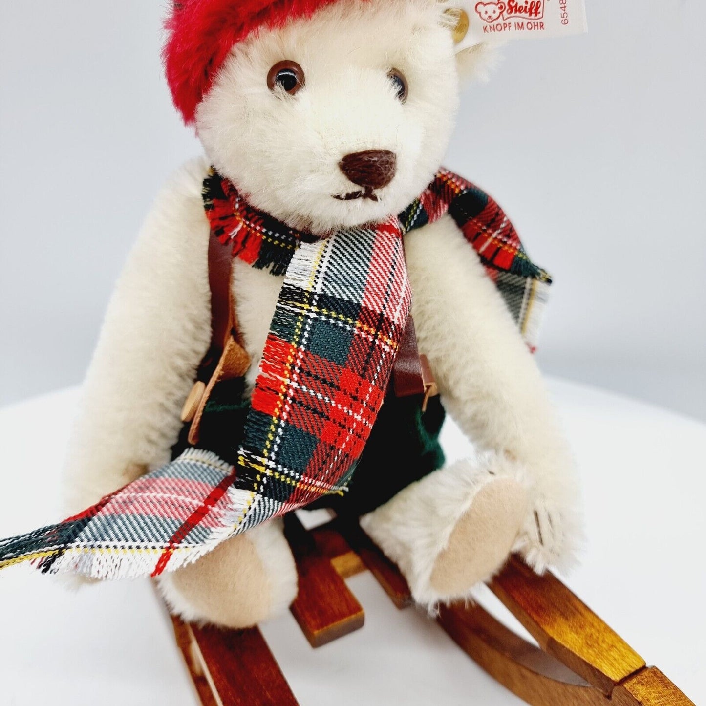 Steiff 654817 The Winter Bear limitiert 21 cm mit Schal und Schlitten