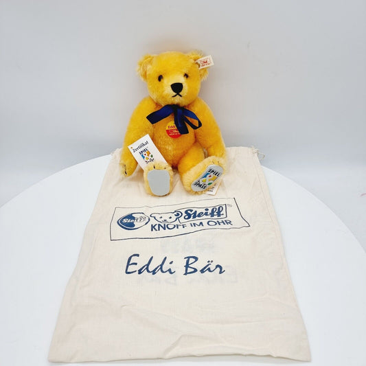 Steiff 650925 Teddybär Eddi Spiel und Spaß mit blauer Schleife